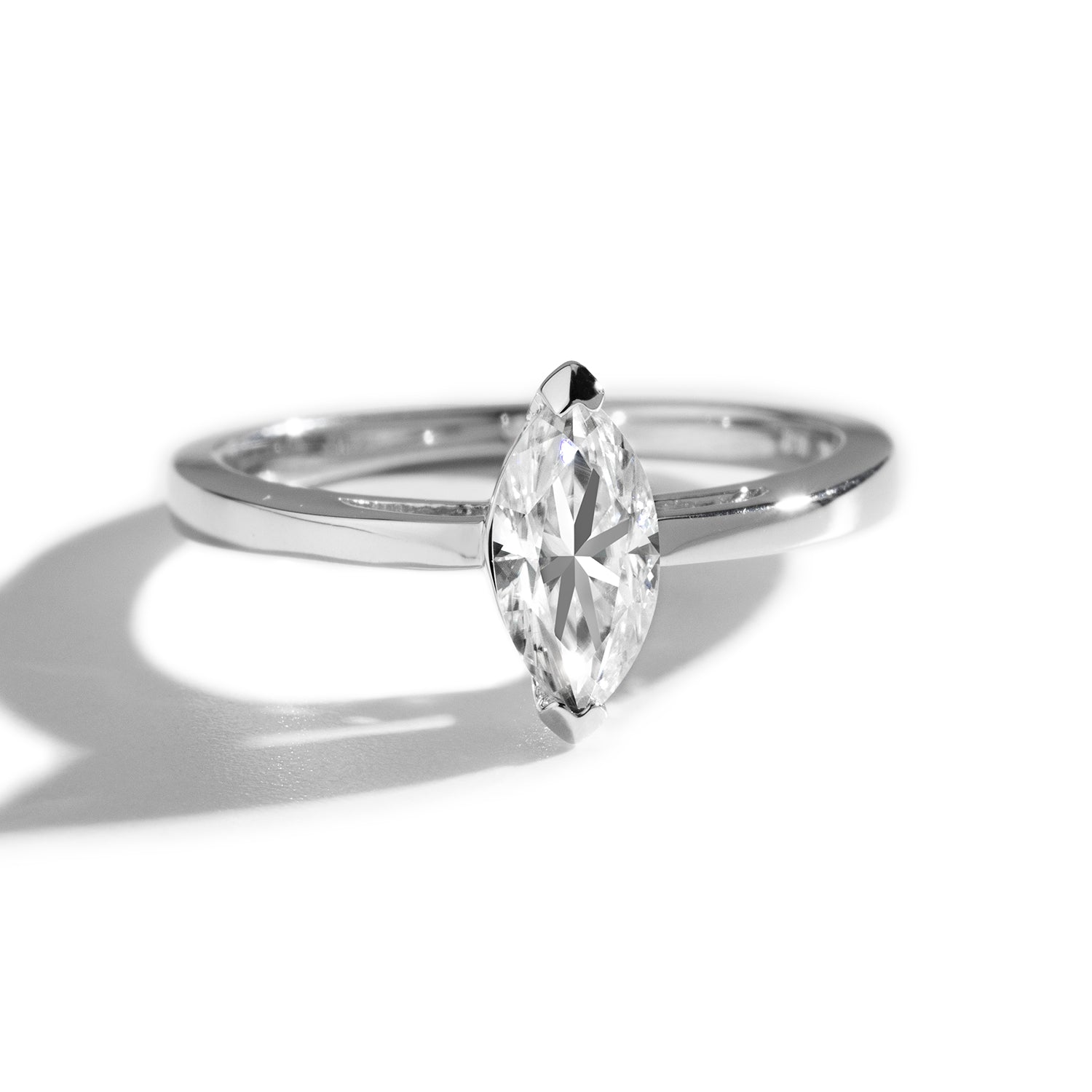 0.70 CTW DEW Marquise Forever Classic™ Moissanite Ring